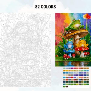 May include: A paint by numbers kit featuring three frogs sitting on mushrooms. The frogs are green, blue, and yellow. The mushrooms are red and brown. The background is a rainbow.