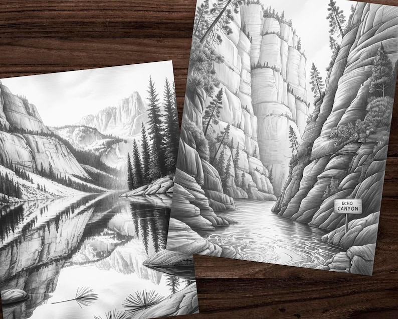 May include: Two black and white landscape art prints. One print depicts a mountain range reflected in a lake. The other print shows a canyon with a river and a sign that reads "Echo Canyon".