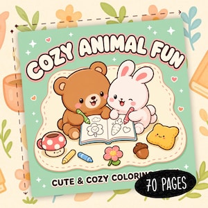 以下が含まれることがあります： ライトグリーンの背景に「COZY ANIMAL FUN」と「CUTE & COZY COLORING」の文字が書かれた正方形の塗り絵の表紙。茶色のクマと白いウサギが本を開いて色を塗っており、その周りにはキノコ、クレヨン、花、どんぐりが描かれています。