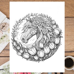 May include: A black and white line drawing of a horse's head surrounded by a wreath of flowers and leaves. The horse's mane and tail are flowing in the wind. The flowers are tulips and other types of flowers.