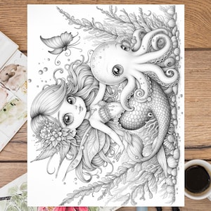May include: A black and white illustration of a mermaid with long flowing hair and a large-eyed octopus wrapped around her tail. The mermaid is wearing a seashell bra and has a flower crown on her head. The octopus has a large eye and a friendly expression. The illustration is surrounded by seaweed and bubbles.
