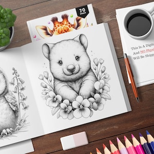 K&ouml;nnte beinhalten: Ein Schwarzwei&szlig;-Malbuch mit einem Pandab&auml;ren, der von Blumen umgeben ist, auf dem Cover. Der Text "70 PAGES" befindet sich oben auf dem Cover.