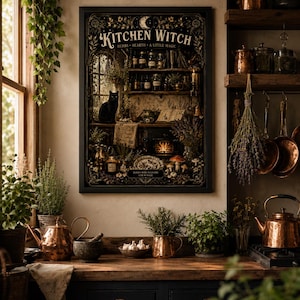 May include: A framed rectangular wall art print titled Kitchen Witch, Herbs, Hearth, A Little Magic. The illustration depicts a dark kitchen scene with a black cat, shelves of jars, a fireplace, and various plants in a warm, moody color palette.