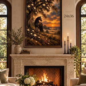 Large black horse and magnolia landscape print displayed in a 24x36 frame above a fireplace in a warm rustic living room.