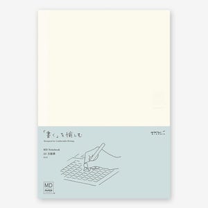May include: A cream-coloured A5 MD Notebook with a grid pattern. The bottom section is light blue and features Japanese text and a hand drawing with a pen. The text reads "Designed for Comfortable Writing" and "MD Notebook".