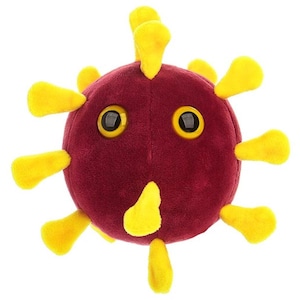 May include: A round plush toy featuring a deep maroon, fuzzy spherical body with large, glossy yellow eyes. The toy is adorned with multiple protruding, soft yellow appendages extending outward from the center, resembling a stylized microbe.