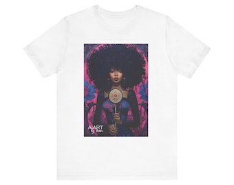 May include: A white t-shirt with a colorful illustration of a woman with an afro holding a microphone. The text "AIART by Raven" is at the bottom of the illustration.