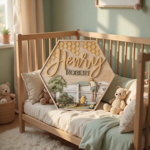May include: A hexagonal wooden wall sign featuring a honeycomb pattern at the top, the names Henry and Robert in raised lettering, and a layered illustration of a child and a bear character standing by a white fence in a grassy landscape.