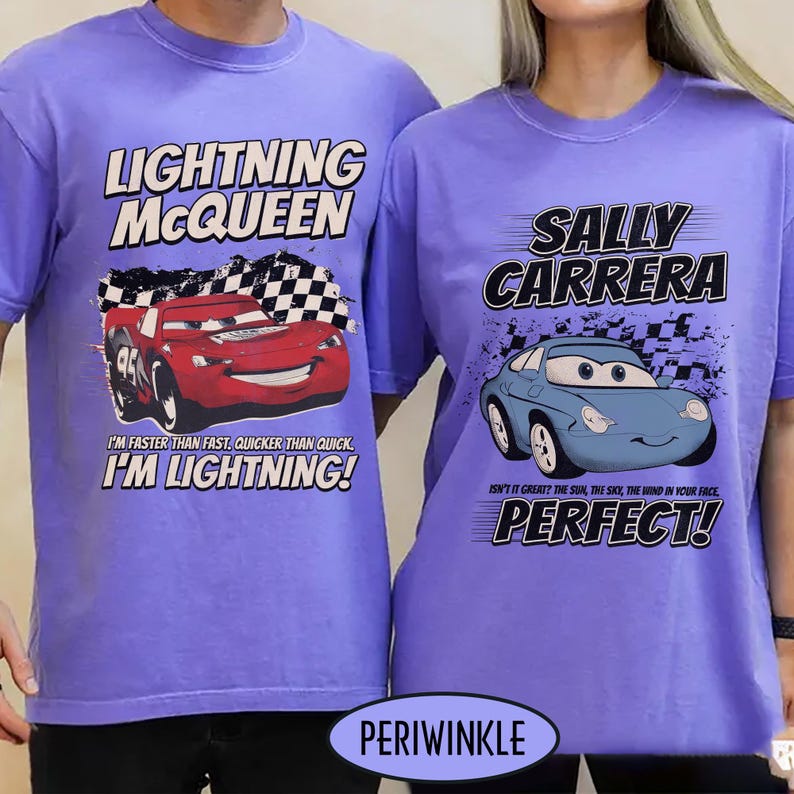 May include: Two periwinkle t-shirts featuring characters from the movie Cars. One shirt has Lightning McQueen with text, "I'M FASTER THAN FAST. QUICKER THAN QUICK. I'M LIGHTNING!" The other has Sally Carrera with text, "PERFECT!"