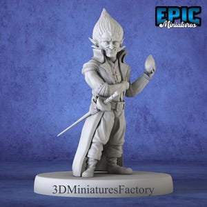 May include: A gray 3D printed miniature of a fantasy character with pointed ears, a long pointed hat, and a long coat. The character is holding a small egg-shaped object in one hand and a sword in the other. The miniature is standing on a round base with the text "3DminiaturesFactory" printed on it.