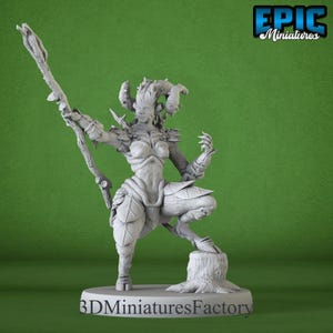 May include: A detailed, unpainted miniature of a mythical creature, possibly a satyr or faun, with horns, leaf-like details, and a staff. The figure is posed on a tree stump, with the text "3D Miniatures Factory" at the base. The Epic Miniatures logo is in the top right.