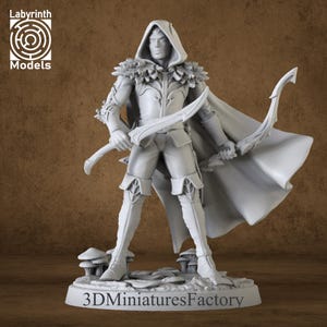 May include: A grey 3D printed miniature of a hooded figure holding a bow and arrow. The figure is wearing a cloak and has a detailed face. The miniature is standing on a base with mushrooms.