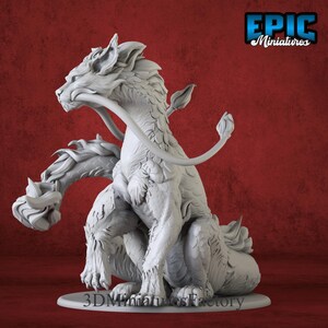 Side view of curled cat dragon 3D-printed miniature