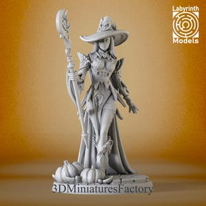 May include: A grey 3D printed miniature of a female witch wearing a pointed hat and holding a staff. She is standing on a base with pumpkins. The base has the text "3D Miniatures Factory" on it.