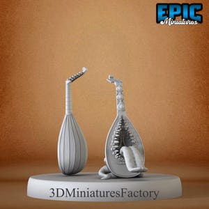 May include: Two 3D printed models of a lute, one with a traditional design and the other with a monstrous, toothy mouth. The models are painted in a light grey colour and are displayed on a white circular base. The base has the text "3D Miniatures Factory" printed on it.