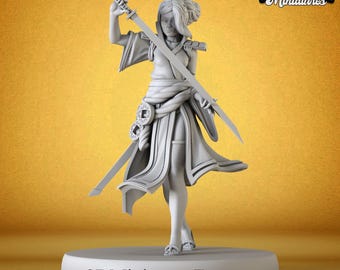 May include: A gray 3D printed miniature of a female figure holding a katana sword. She is wearing a long, flowing robe with a belt and a decorative sash. The miniature is standing on a round base with the text "3DminiaturesFactory" printed on it.