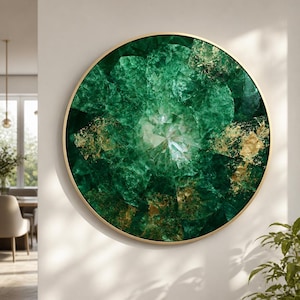 May include: A circular wall art piece featuring a deep emerald green gemstone pattern with crystalline textures and scattered gold leaf accents, enclosed within a thin, polished gold-toned metal frame that highlights the vibrant color contrast.