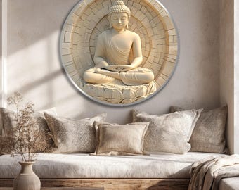 May include: A beige Buddha sculpture in a meditative pose, mounted on a circular, textured background. The artwork is framed in a silver-colored border. The Buddha is seated on a lotus flower, with hands resting in the lap. The overall theme is spiritual and decorative.