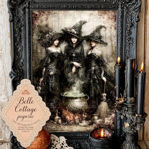 May include: A framed print featuring three figures in black pointed hats and dark dresses standing around a steaming cauldron. A label reads Belle Cottage paperie FINE ARTISAN RICE PAPER. Three black candles in a decorative holder sit nearby.