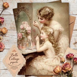 May include: Vintage-style print featuring a mother and daughter applying makeup in front of a mirror. The image has a soft, romantic aesthetic with a palette of creams, pinks, and browns. The print is accompanied by dried roses and a decorative label that reads "Belle Cottage paperie."