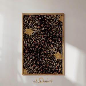 May include: A framed print with a black background and a gold and red floral pattern. The pattern features stylized flowers with gold stems and red centers.