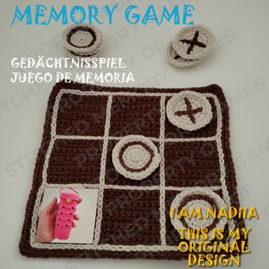 May include: A handmade crochet memory game with a brown and cream color scheme. The game board features a grid pattern, with matching game pieces. The image includes the text "MEMORY GAME", "I AM NADIIA", and "THIS IS MY ORIGINAL DESIGN".