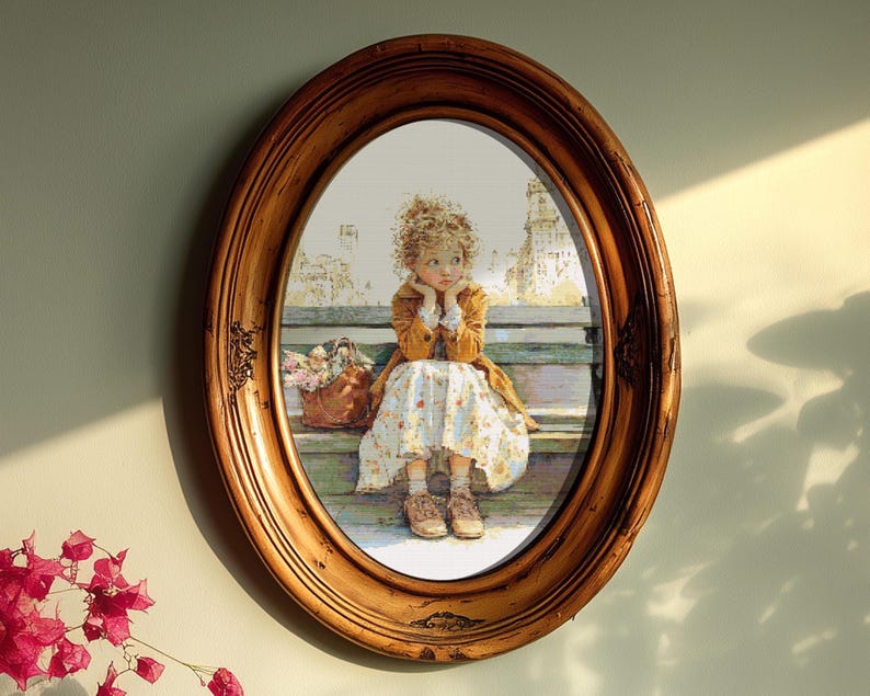 May include: An oval, wooden framed print of a young girl sitting on a bench, with a basket of flowers. The girl is wearing a yellow coat and floral dress. The frame has a distressed, antique finish.