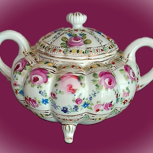 Handpainted Floral Sugar Bowl shaped like a tureen. Footed, Handles, Lid