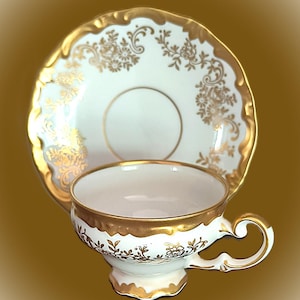 Weimar Porcelain, Katharina Pattern. Hand Painted Floral Gold Trim. White and Gold Cup/Saucer