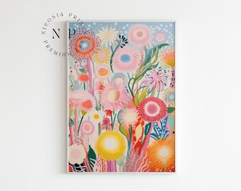 May include: A colorful abstract floral print with pink, red, yellow, blue, and green flowers on a light blue background.
