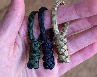 Set of 15 Survival Paracord Zipper pulls | Bushcraft gear keychain | Custom color cord bag zipper pendant | Durable Snake knot bag accessory