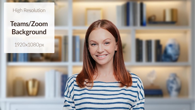 May include: A woman with long, red hair smiles at the camera. She is wearing a striped blue and white shirt. The background is a blurry image of a bookshelf with books and decorative objects.