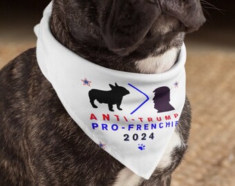 May include: A black and brown French bulldog wearing a white bandana with the text "ANTI-TRUMP PRO-FRENCHIE 2024" and a silhouette of a dog and a person.