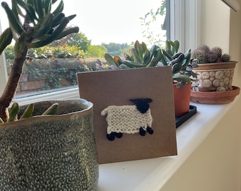 Hand knitted wool sheep greetings card. Can be personalised.