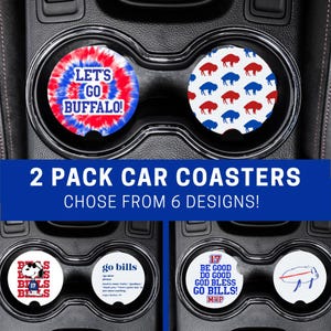 May include: Car coasters with various designs, including a red, white, and blue tie-dye coaster with "LET'S GO BUFFALO!" text. Another coaster features red and blue buffalo silhouettes on a white background. The image also shows the text "2 PACK CAR COASTERS CHOSE FROM 6 DESIGNS!"
