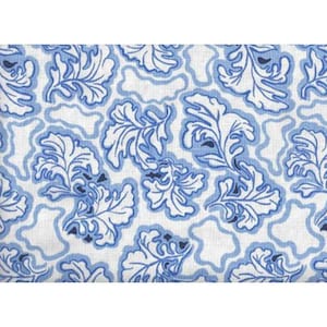May include: White fabric with a repeating pattern of blue stylized leaves and wavy outlines. The leaves have intricate details and are outlined in a darker shade of blue. The design creates a textured, organic feel.