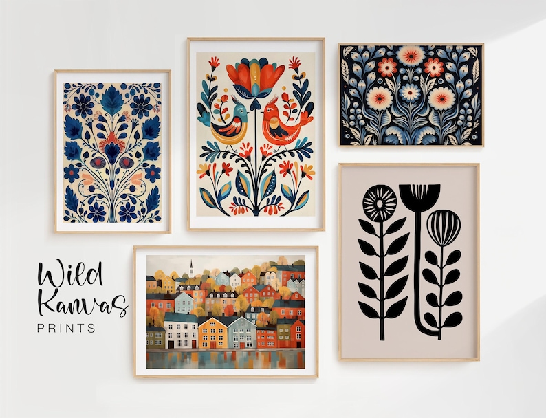 Five framed art prints with floral and landscape designs. The prints feature a variety of colours, including blue, orange, and black. The text "Wild Kanvas PRINTS" is displayed in the lower left corner.