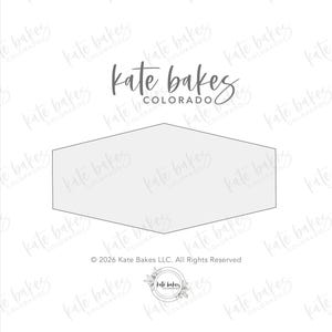 May include: A light gray, geometric cookie cutter in a hexagonal shape. The text "kate bakes COLORADO" is in a script font above the cutter. The image also includes the text "© 2026 Kate Bakes LLC. All Rights Reserved."