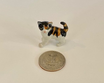 Hand-Painted Miniature Porcelain Calico Cat Figurine – 25166