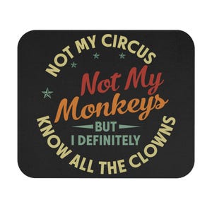 May include: Black square mousepad with the text "NOT MY CIRCUS, NOT MY MONKEYS BUT I DEFINITELY KNOW ALL THE CLOWNS" in a retro font. The text is in shades of yellow, red, orange, and green.