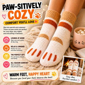 May include: A pair of fuzzy, cream-colored socks featuring a cat paw design with brown stripes and orange toe pads. The socks are textured and soft, extending to the mid-calf. The image includes promotional text and a small inset photo of the socks.