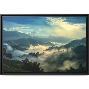 May include: A panoramic view of a misty mountain landscape with rolling hills and lush green vegetation. The sky is a vibrant blue with fluffy white clouds and a golden glow from the sun.