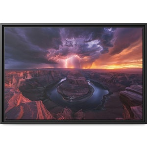 May include: A dramatic sunset over a horseshoe bend in a canyon, with lightning striking in the distance. The sky is a mix of purple, orange, and pink, with dark clouds overhead. The river below is a deep blue, and the canyon walls are a reddish-brown.