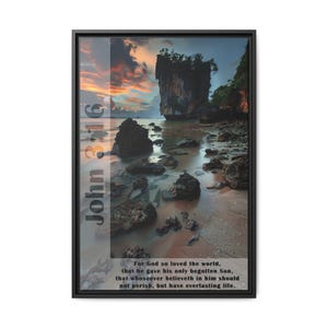 May include: A framed print with a scenic image of a rocky beach at sunset. The print features the Bible verse John 3:16, which reads "For God so loved the world, that he gave his only begotten Son, that whosoever believeth in him should not perish, but have everlasting life."