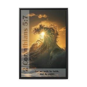May include: A framed canvas print with a photograph of a large wave crashing in the ocean at sunset. The sun is shining through the wave, creating a golden glow. The text "2 Corinthians 5:7" and "For we walk by faith, not by sight" is printed on the canvas.