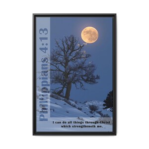 May include: A framed print with a wintery landscape scene featuring a lone tree covered in frost and a full moon in the sky. The text "Philippians 4:13" and the quote "I can do all things through Christ which strengtheneth me." are printed on the left side of the image.