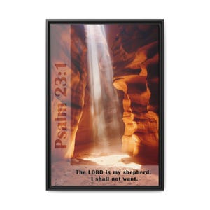 May include: A framed print with a photograph of a canyon with a beam of light shining through. The print has the text "Psalm 23:1" and "The LORD is my shepherd; I shall not want."