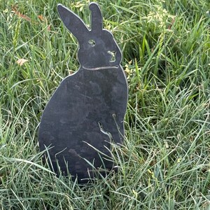 Standing rabbit yard art