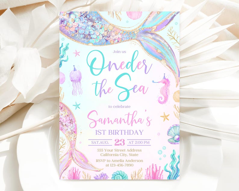 May include: A pink and blue mermaid-themed first birthday party invitation with a mermaid tail, seashells, and the text "Join us Oneder the Sea to celebrate Samantha's 1st Birthday SAT AUG. 23 AT 2:00 PM 555 Your Street Address California City, State RSVP to Amelia Anderson at 123-456-7890"