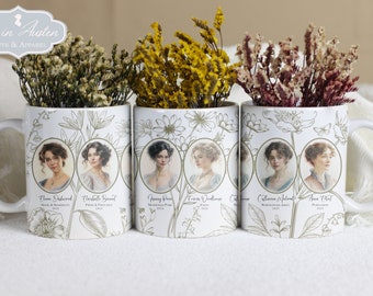 May include: Three white ceramic mugs with floral designs and portraits of women, each holding dried flowers. The mugs feature portraits of literary characters and the text "Lost in Austen Gifts & Apparel."